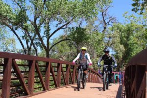 Cyclists on the Mill Creek Parkway in Moab