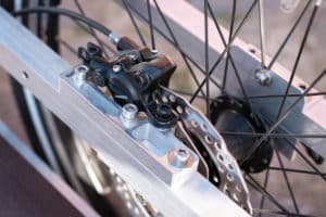 Mounts for the brake body of the hydraulic disc brakes on the Trude Trailer bicycle trailer