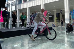 Timotheus Höttges, CEO of Deutsche Telekom AG, riding the Telekom Bike