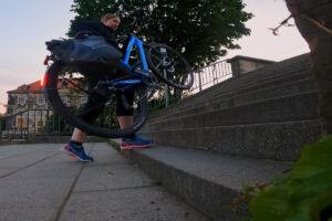 Carrying the Ridetronic ebike up a flight of stairs