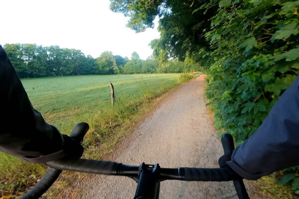 Riding the Lapierre e-Crosshill 5.2 e-gravel bike on a dirt road