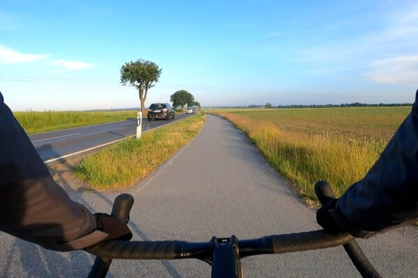 Riding the Lapierre e-Crosshill 5.2 e-gravel bike on an asphalt bike path