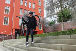 Cube Editor Hybrid ebike is carried down a flight of stairs