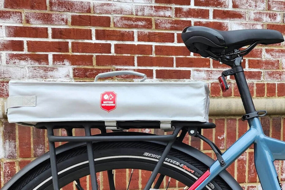 Battery Safeguard Bagfireproof protective bag for ebike batteries attached to a bicycle rack