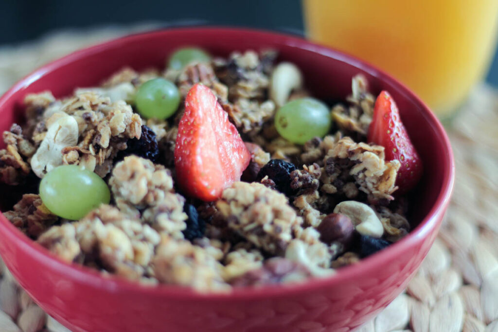 Bowl of muesli and fresh fruit